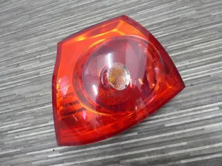 Original VW Golf V - Heckleuchte Rückleuchte Rücklicht links außen - 1K6945095E - Bild 1